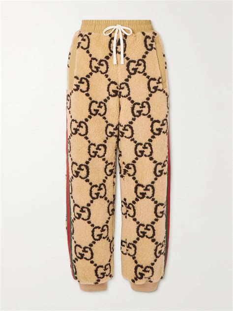 pantaloni gucci fake